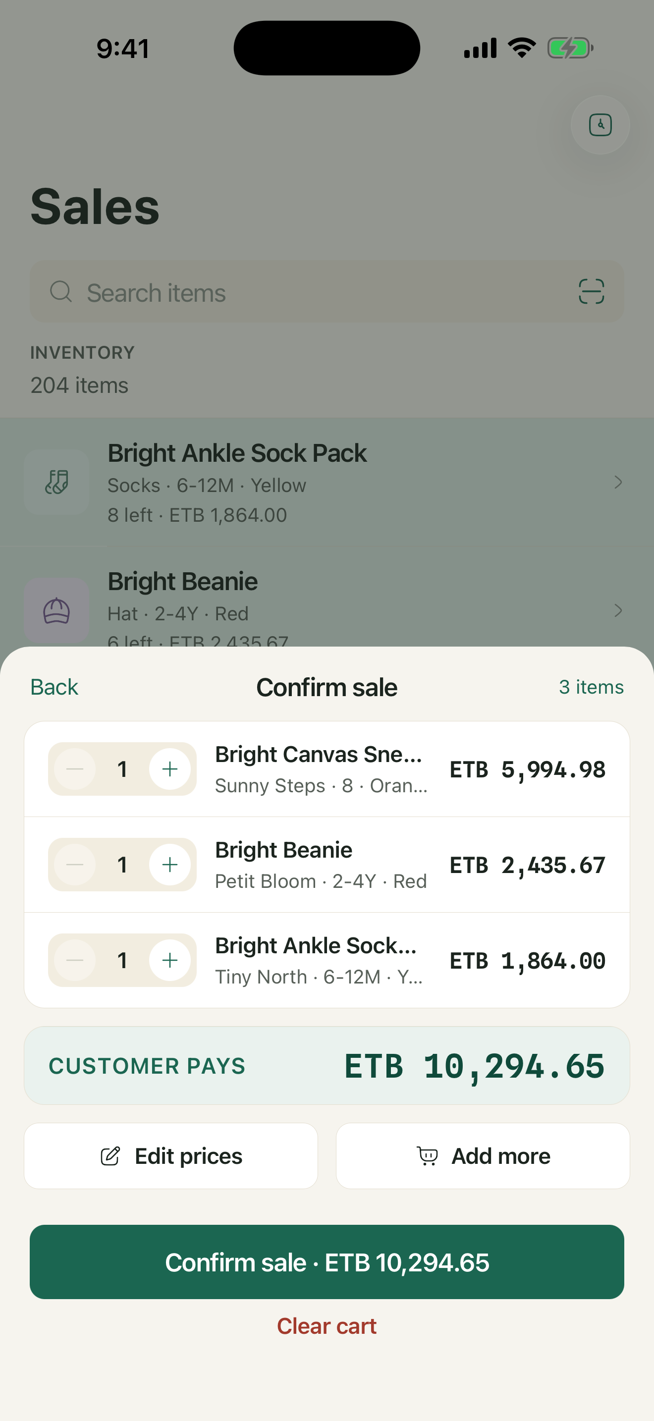 Confirm sale screen with cart and total
